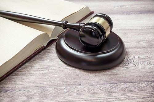 A gavel and a book